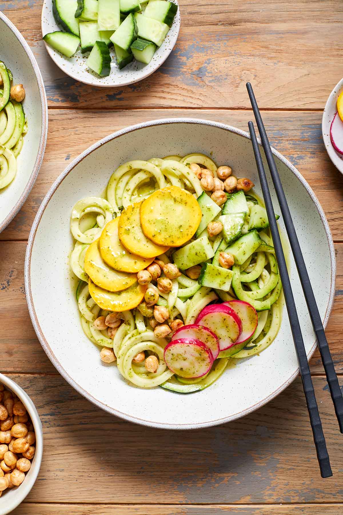 Overhead view of a zucchini noodle bowl with toppings.