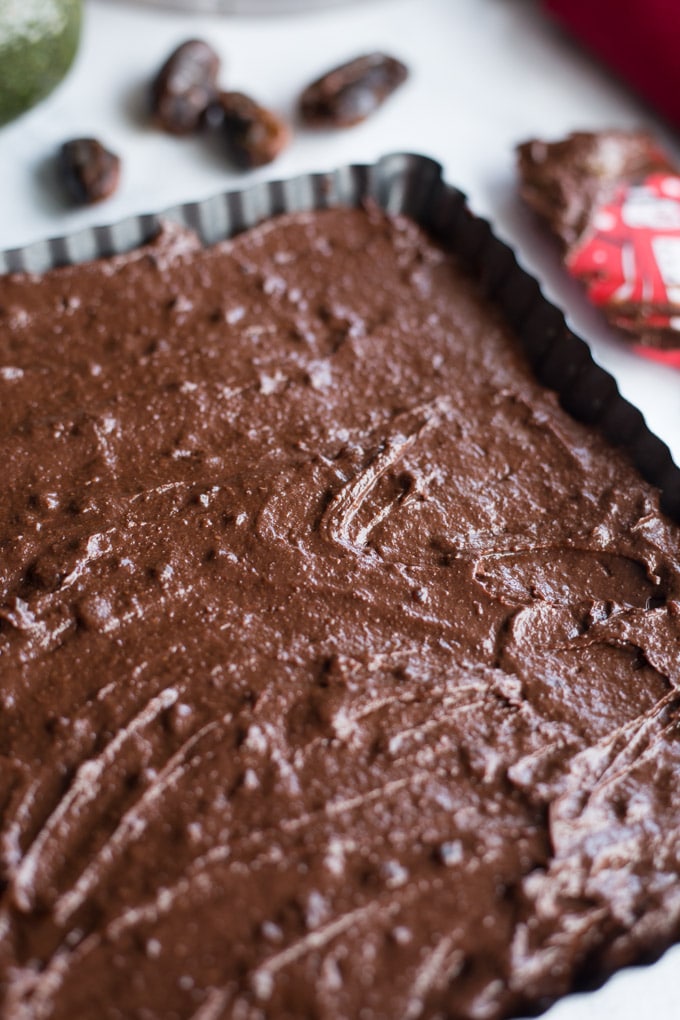 Batter for Peppermint Mocha Fudge Avocado Brownies in a pan and ready for baking.