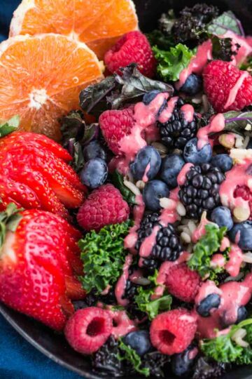 Close up of raspberry citrus salad in a bowl.