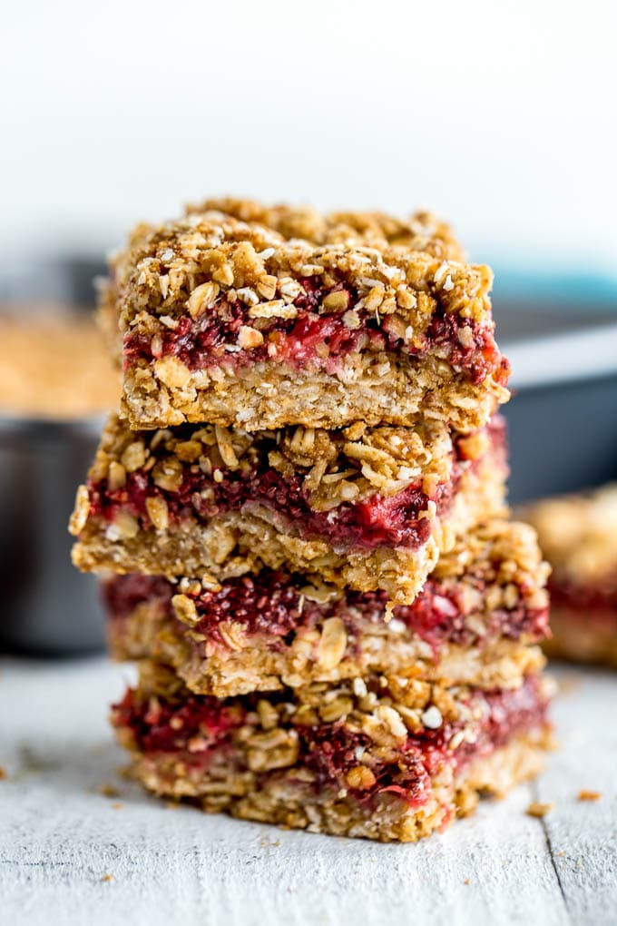 Up-close side view of a stack of Strawberry Oat Bars.