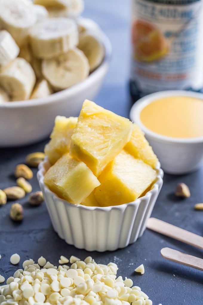 Ingredients to make Orange Pineapple Nice Cream Pops.