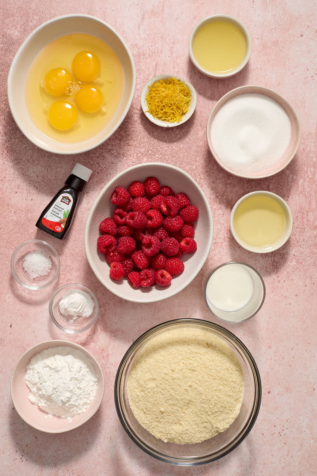 Raspberry lemon cake batter ingredients arranged individually.