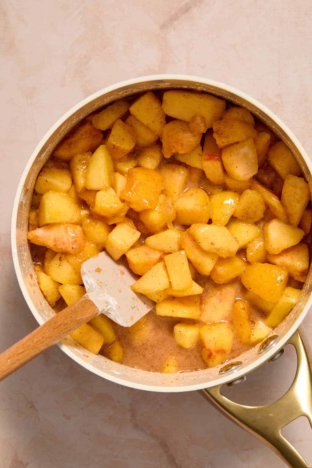 Chopped peaches stirred together with the other filling ingredients in a small saucepan.