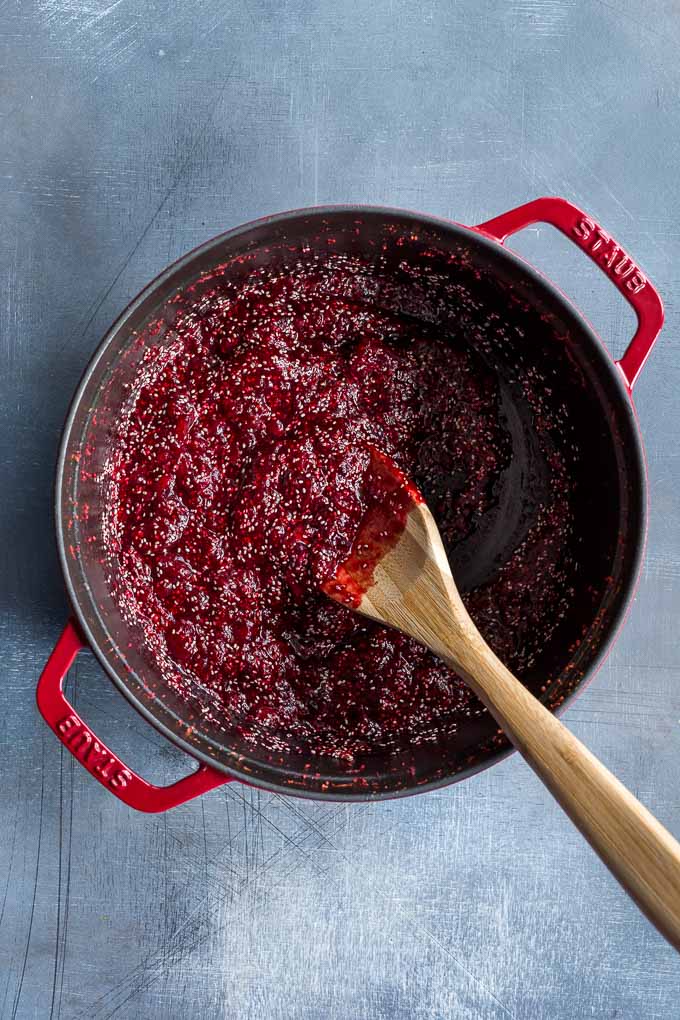 Overhead view of healthy cranberry sauce in a large pot.
