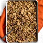 Overhead of pumpkin spice granola on a sheet pan.