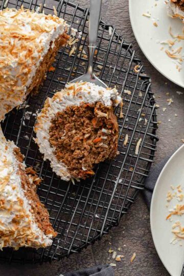 Overhead of coconut carrot bundt cake cut into slices.