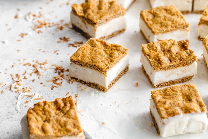 Ice cream sandwich squares arranged on a light coloured surface.