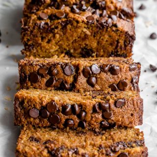 Side view of spelt flour banana bread cut into thick slices.