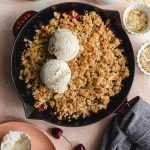 Cherry Almond Crisp baked up in a cast iron skillet.