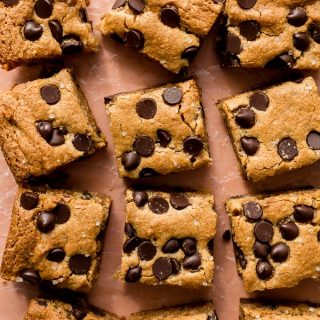Almond flour blondies loaded with chocolate chips and cut into bars.