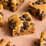 Angled view of almond flour blondies topped with chocolate chips.