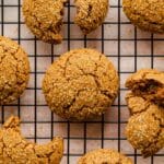 Overhead of ginger molasses cookies on a wire rack.