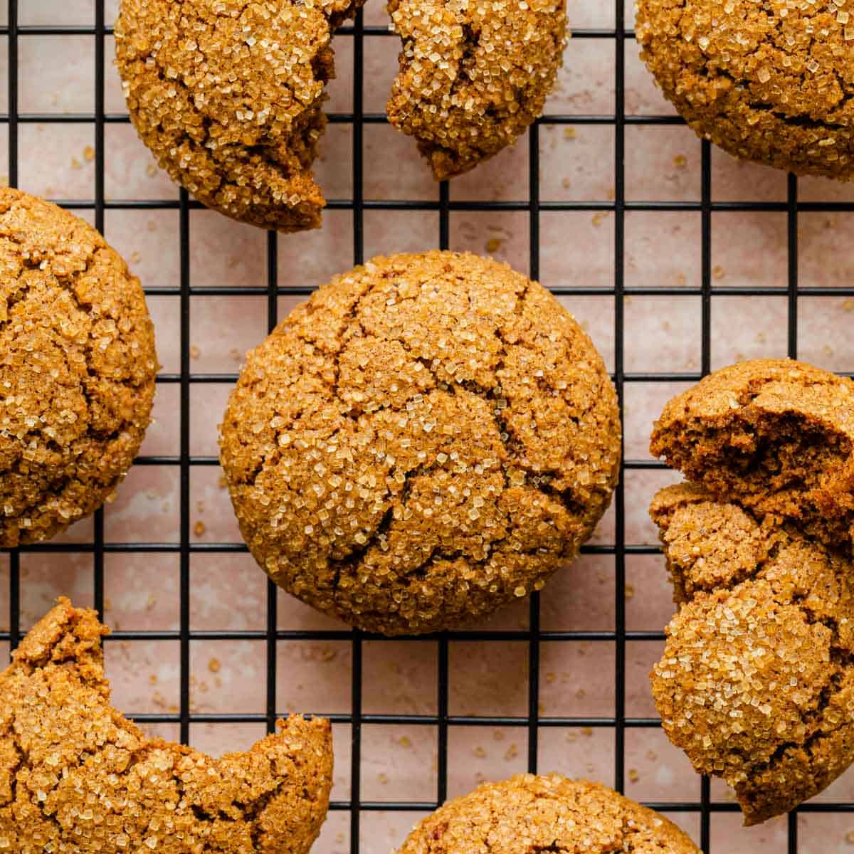 Overhead of ginger molasses cookies on a wire rack.