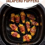 Air fried jalapeño poppers in an air fryer basket.