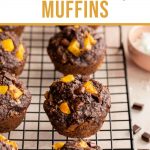 Pinterest image of mango oatmeal muffins arranged on a wire rack.