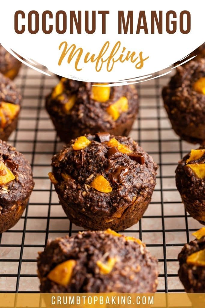 Pinterest image of coconut mango muffins on a wire rack.