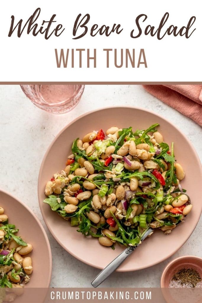 Pinterest image for white bean tuna salad served on a pink plate.