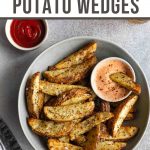 Pinterest image with air fryer potato wedges in a grey bowl.