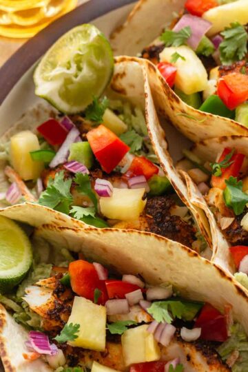 Close up of air fryer fish tacos on a platter.