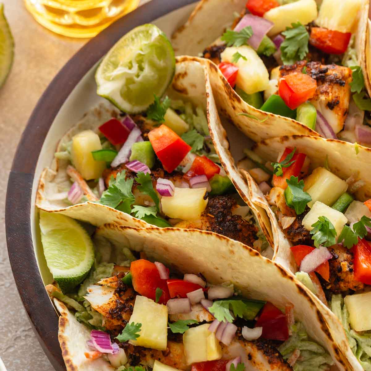 Close up of air fryer fish tacos on a platter.