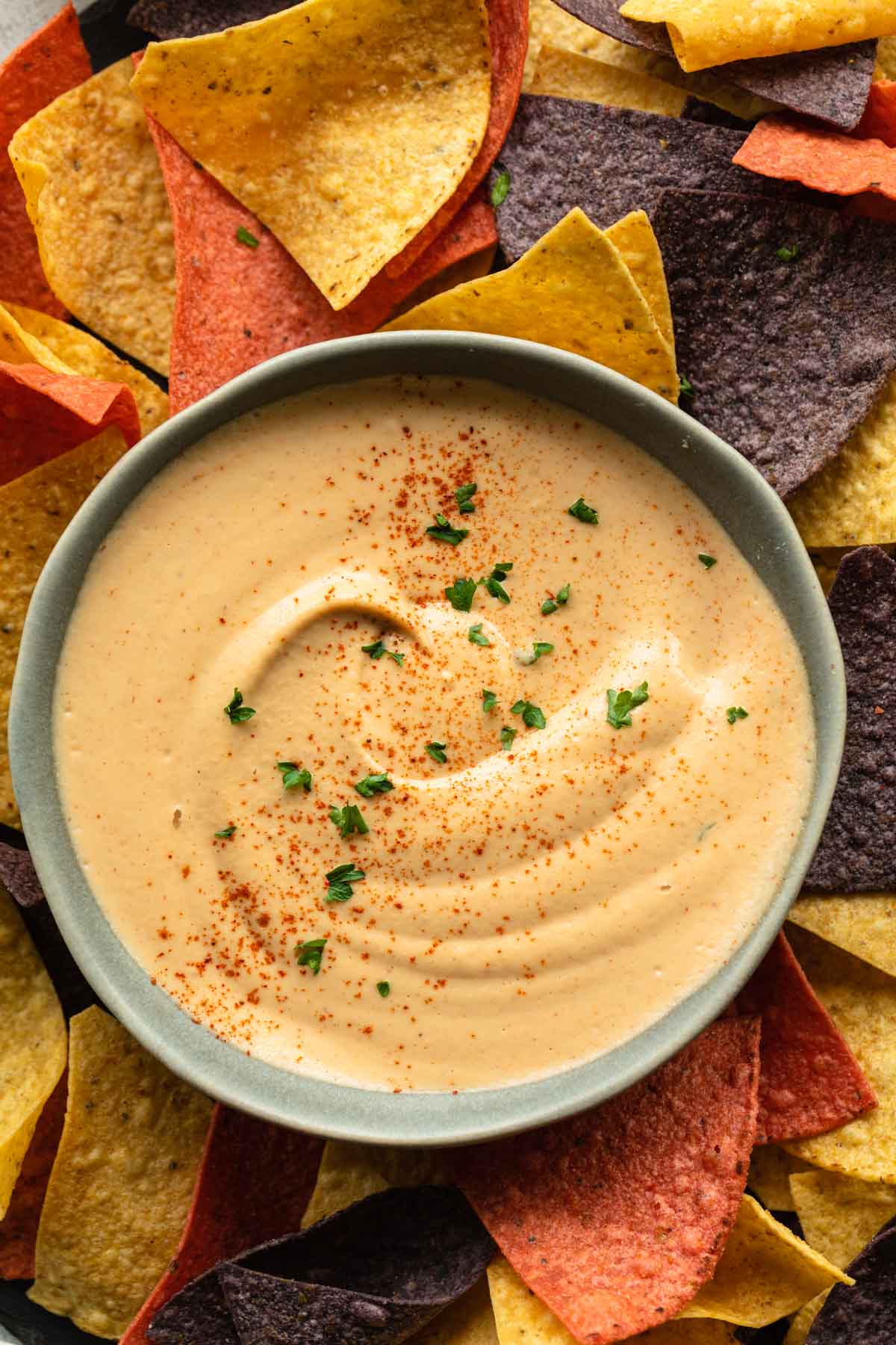 Overhead of chipotle sauce in a bowl and served with tortilla chips.