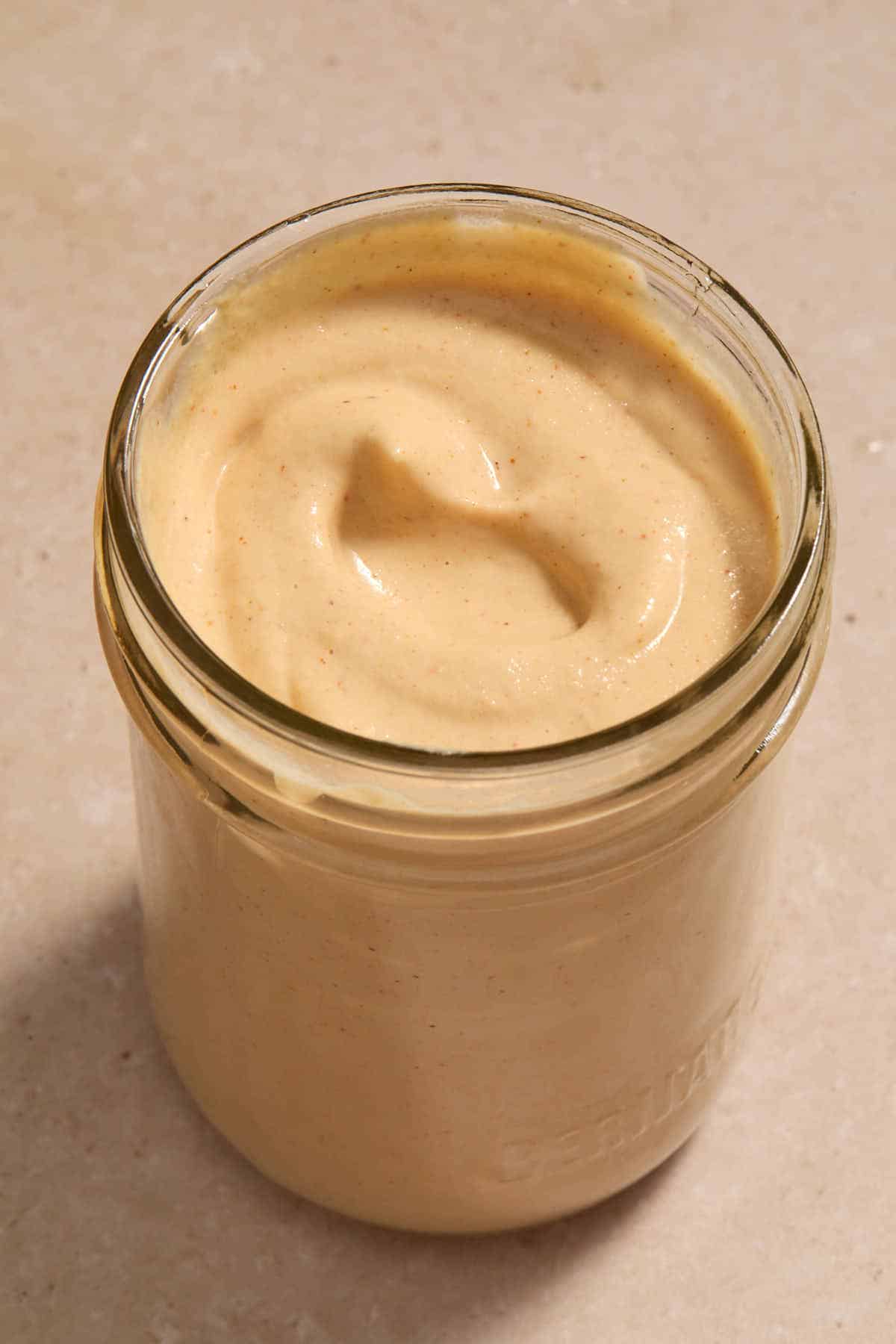 Chipotle sauce in a glass mason jar.