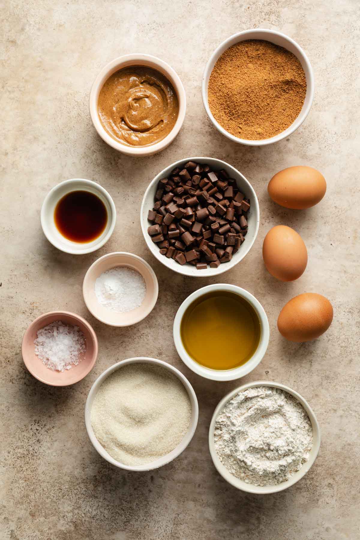 Ingredients to make almond butter brownies arranged individually.