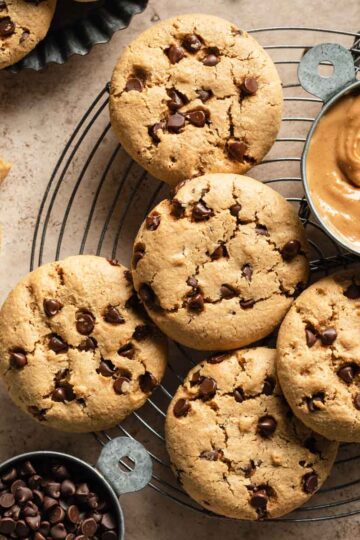 Almond flour peanut butter cookies arranged on a round wire rack.