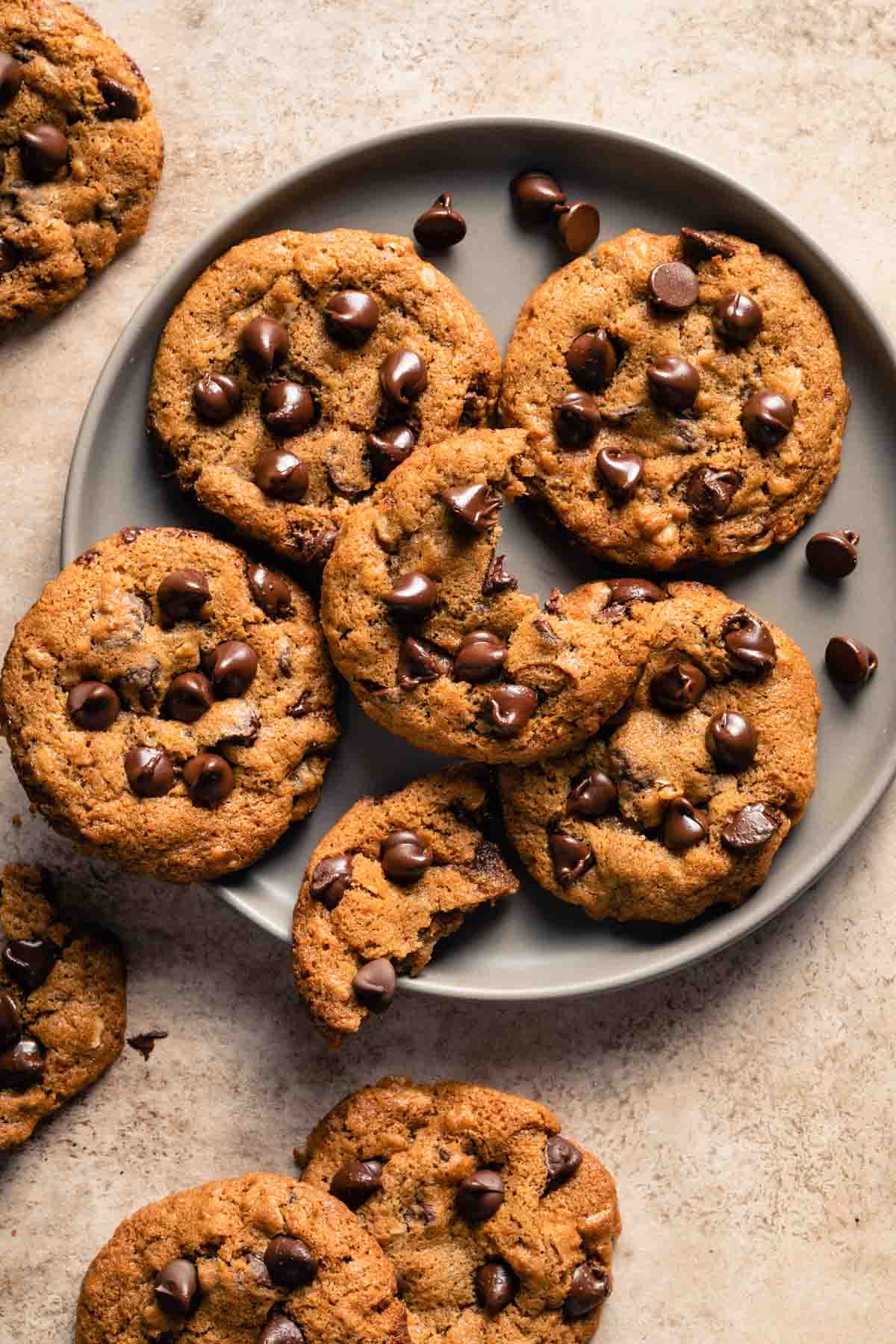 Air fried chocolate chip cookies arranged on a plate.
