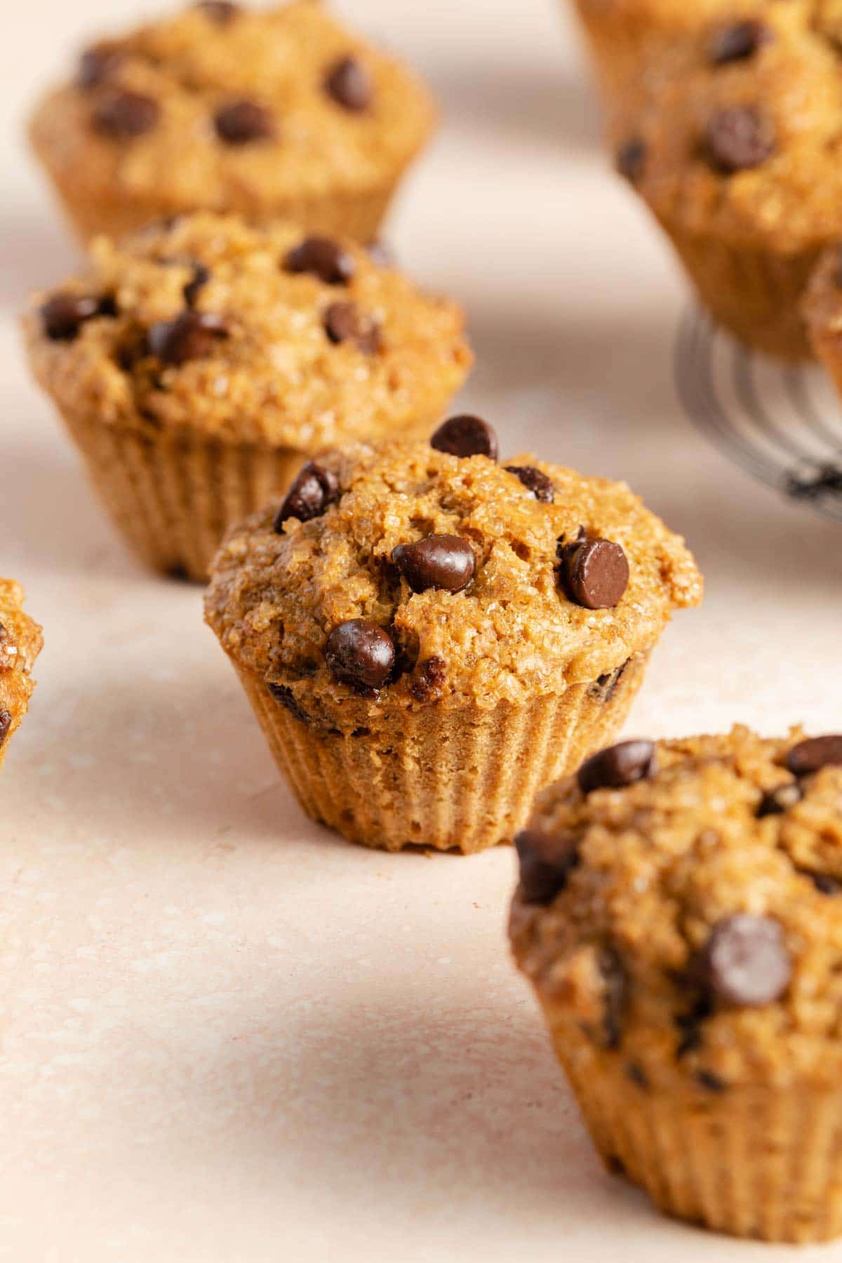 Side view of air fryer chocolate chip muffins.