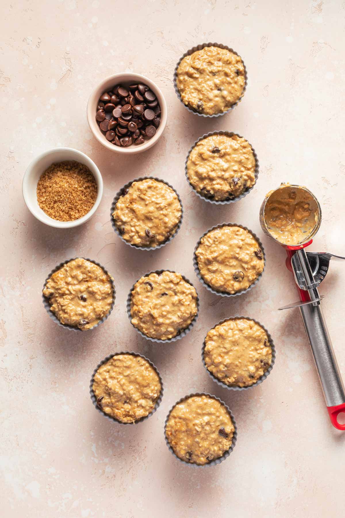 Overhead view of muffin batter in silicone muffin cups.