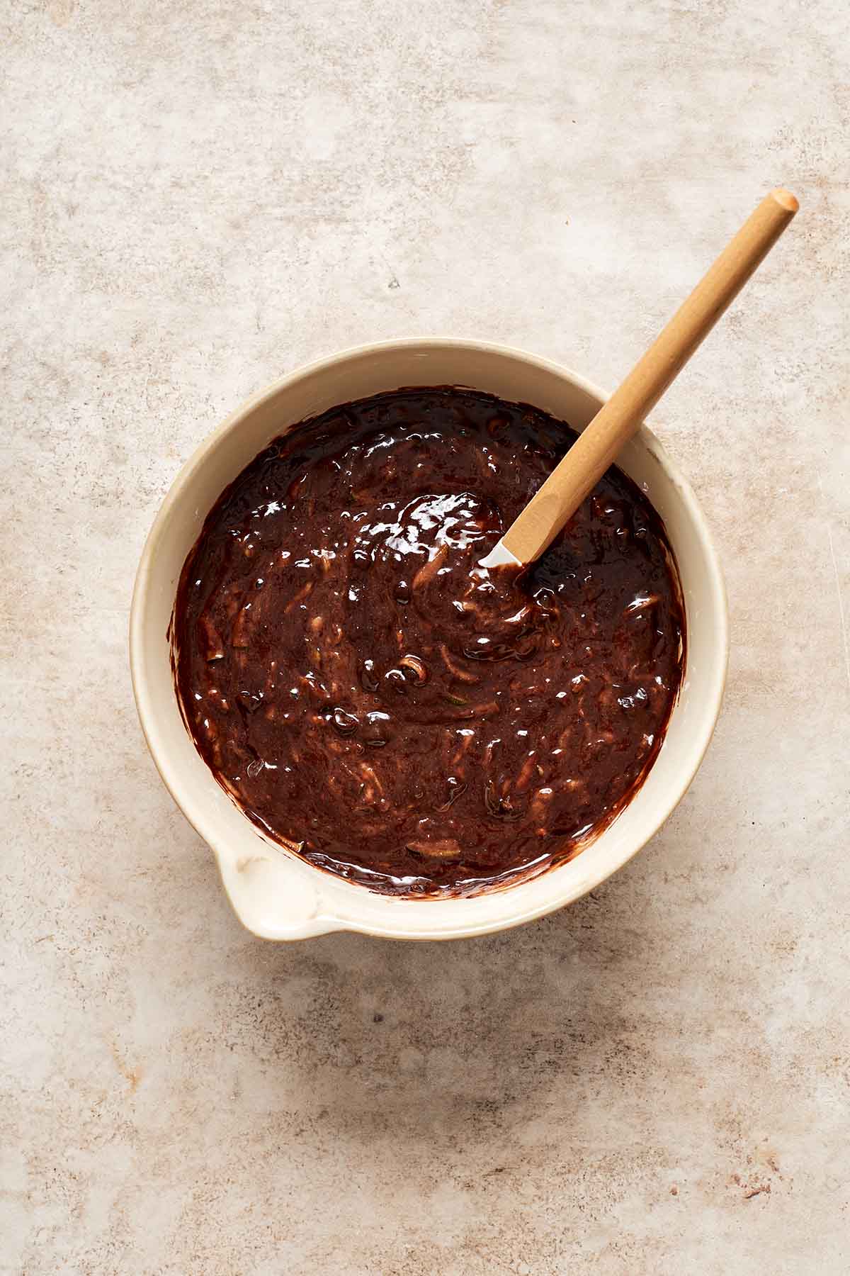 Dry ingredients stirred into the wet mixture.