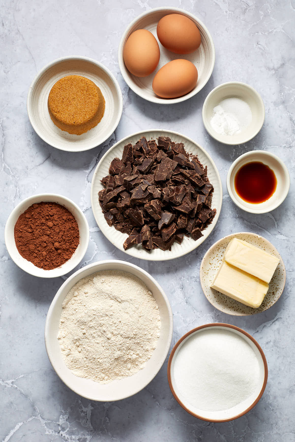 Ingredients to make oat flour brownies arranged individually.