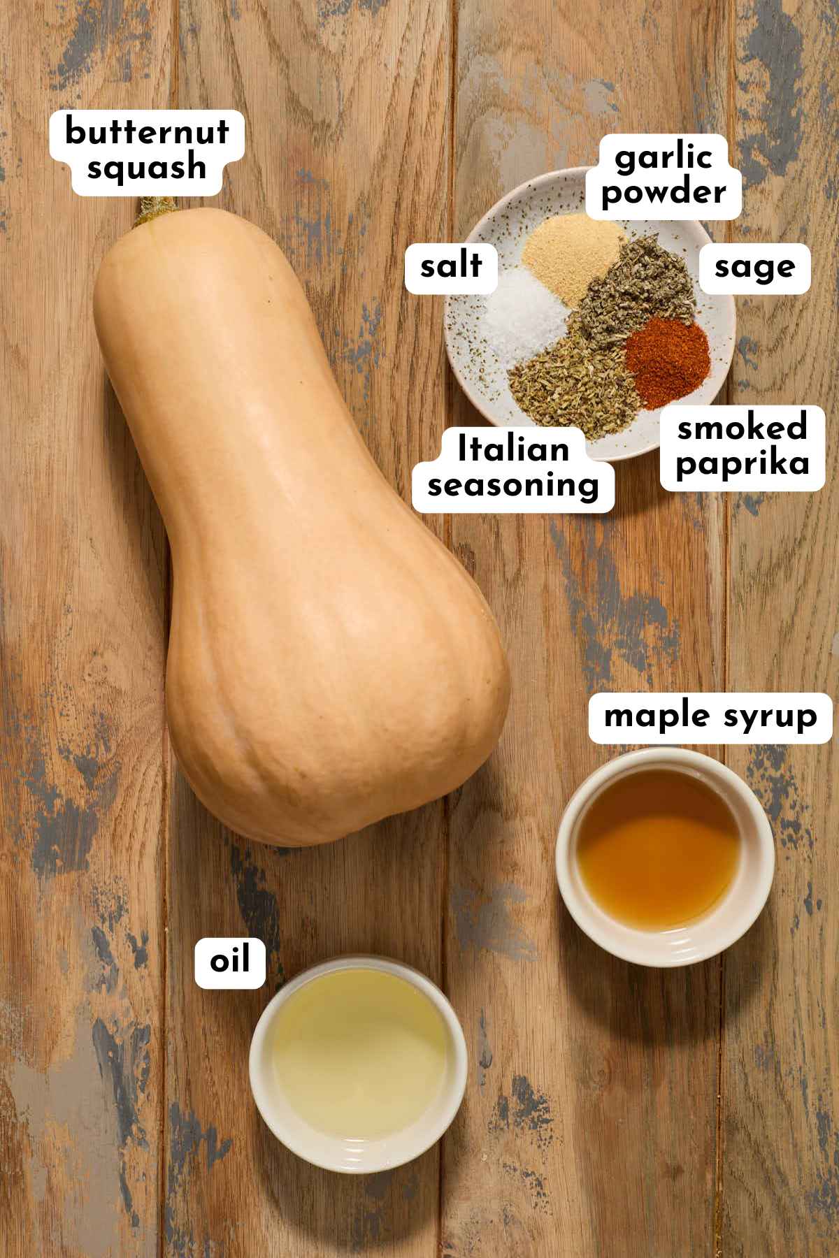 Ingredients to make air fryer butternut squash arranged separately on a surface and labeled.
