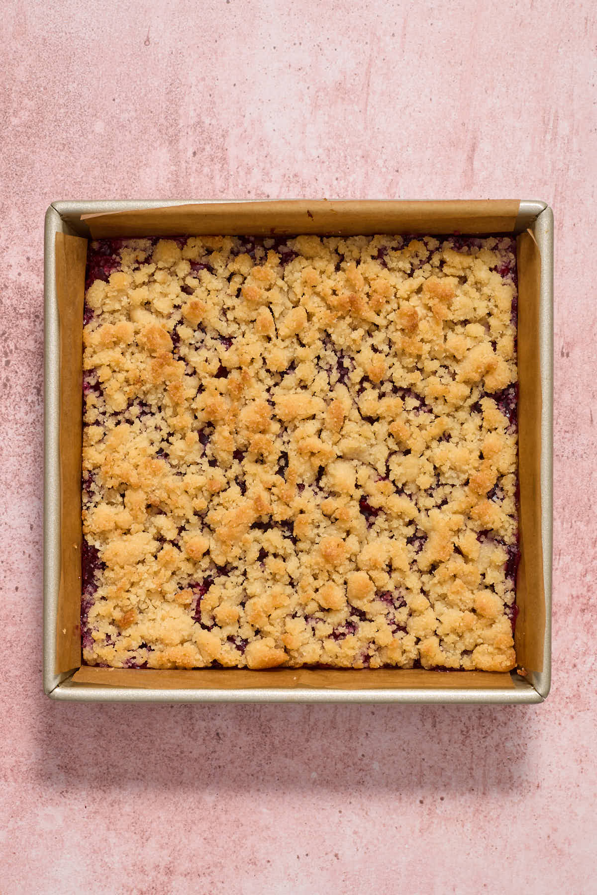 Baked cherry bars cooling in the pan.