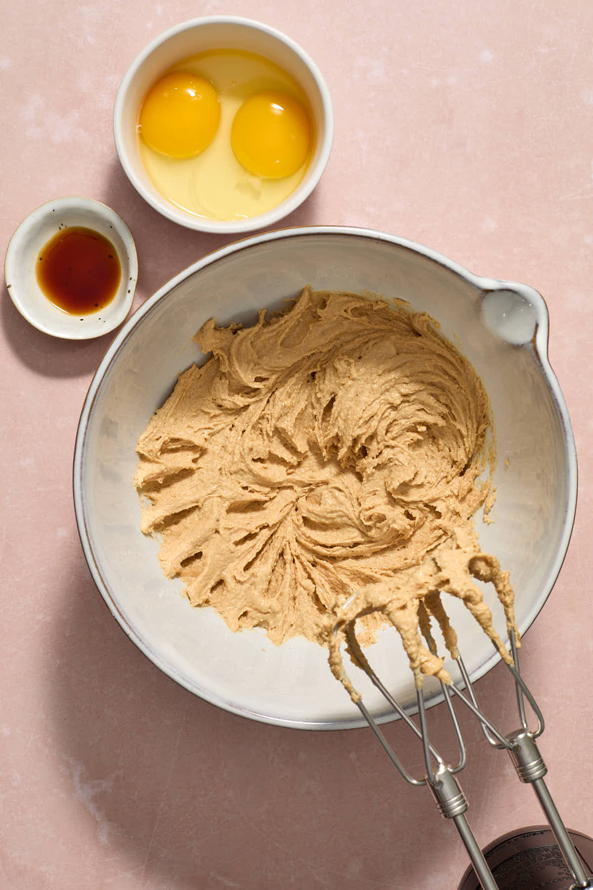 Peanut butter, butter and sugars creamed together with eggs and vanilla on the side.