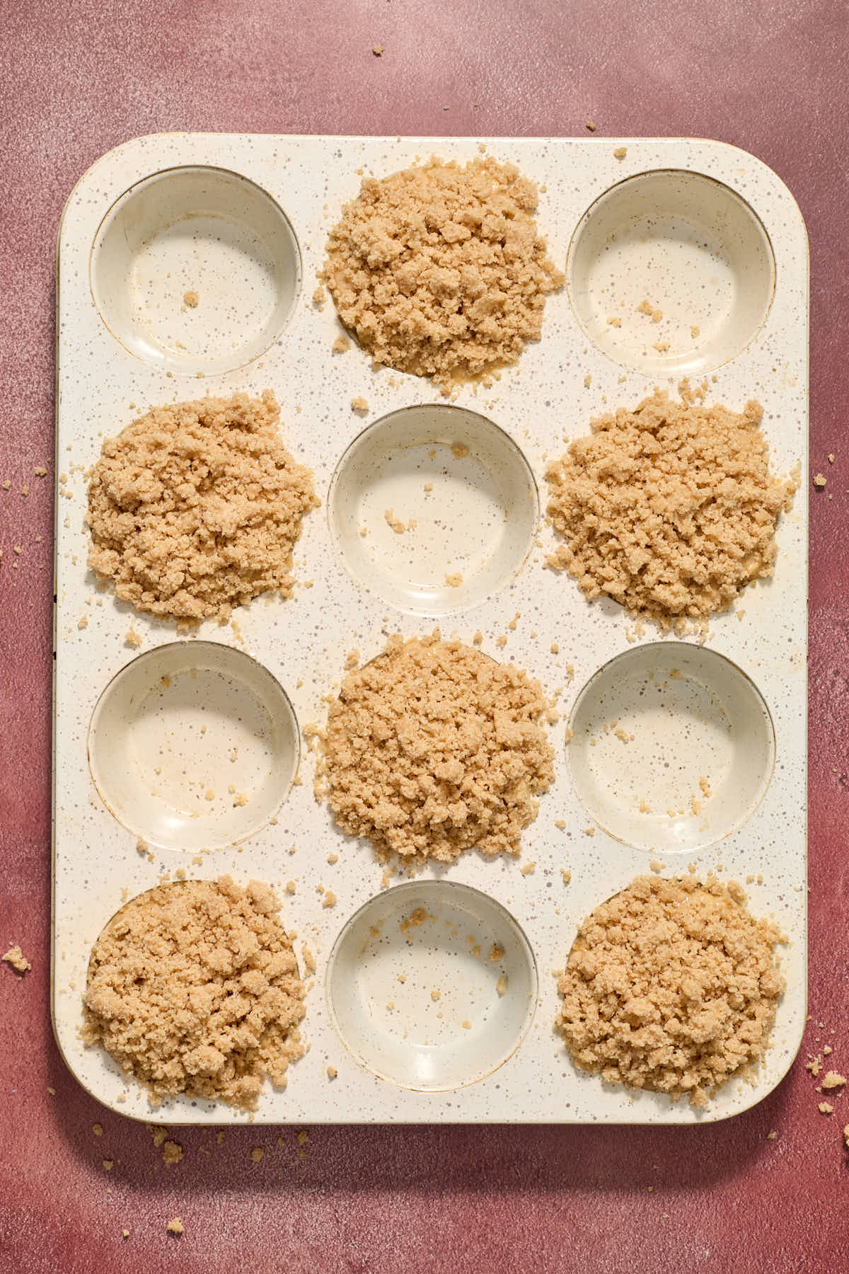 Streusel topping added to the muffins before baking.