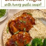 Pinterest image for air fryer chicken thighs with honey garlic sauce.