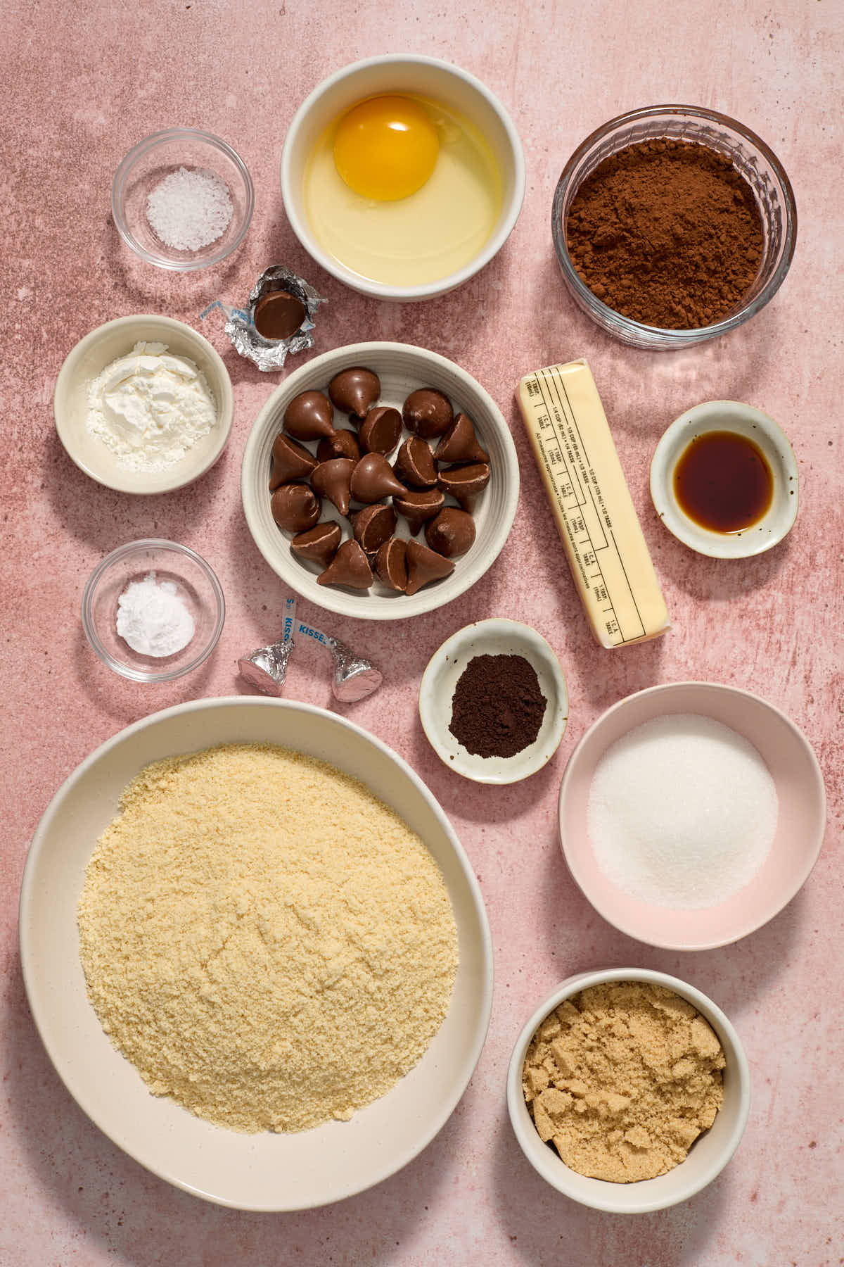 Ingredients to make chocolate blossom cookies arranged individually.