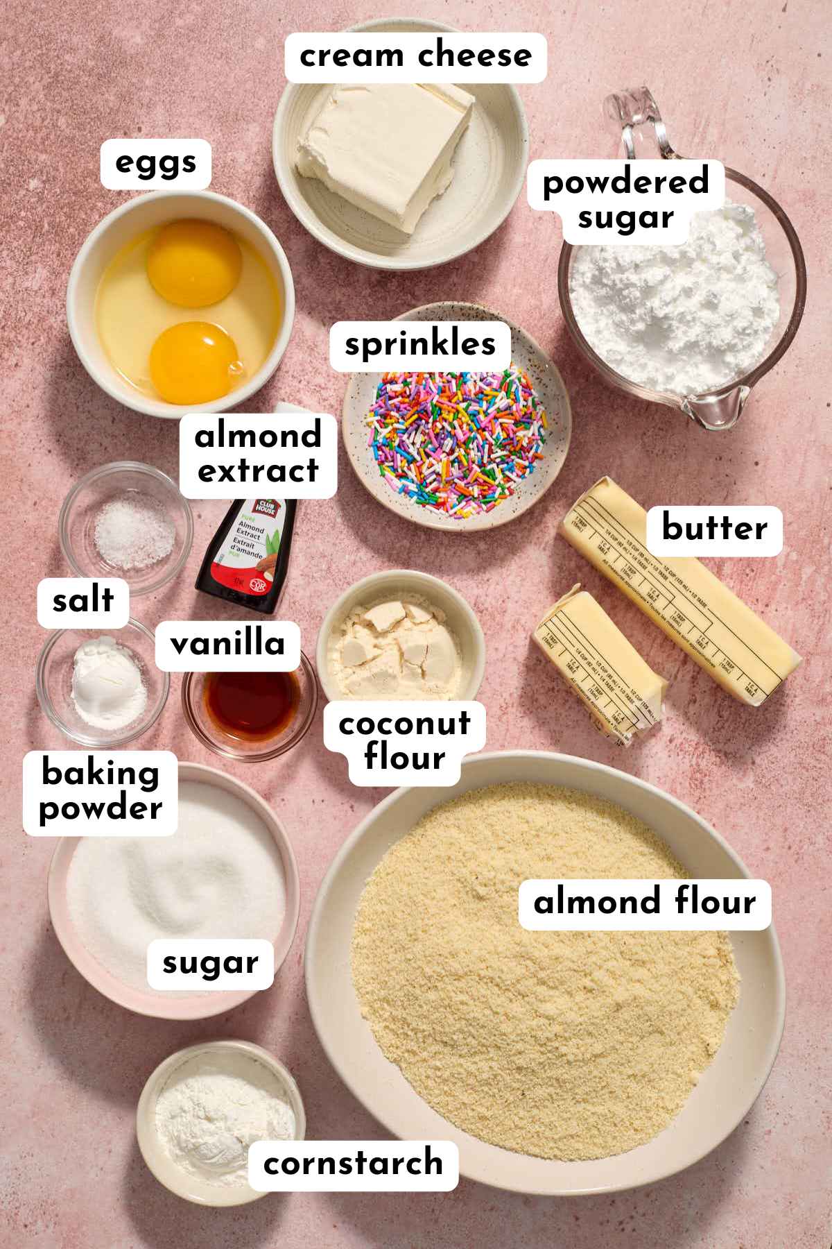 Ingredients for making gluten-free sugar cookie bars arranged individually and labeled.