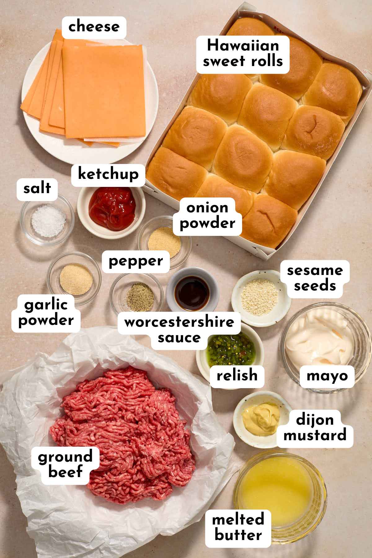 Ingredients for making air fryer ground beef sliders arranged individually and labeled.