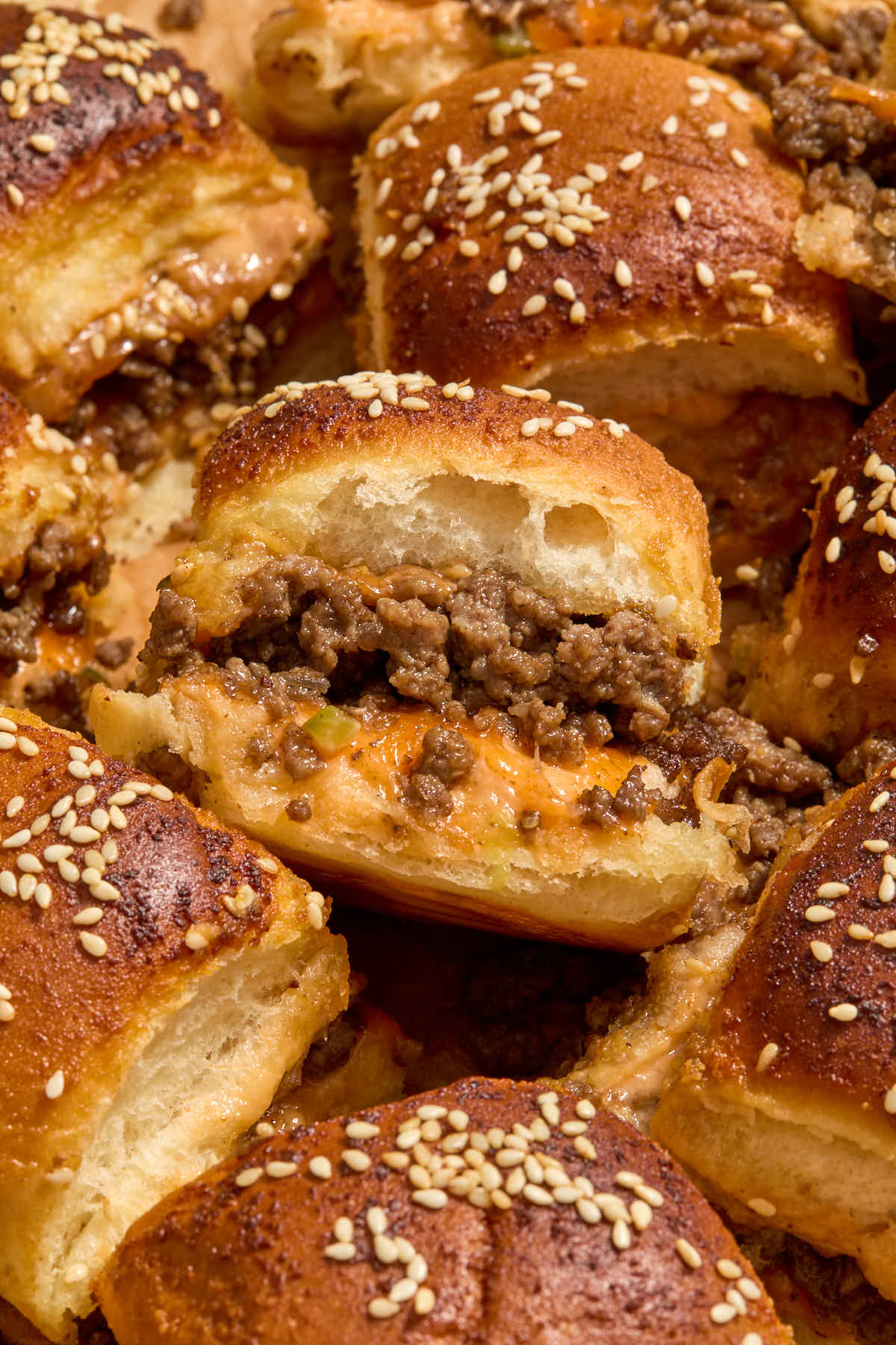 Angled close up of a slider resting on top of another one.