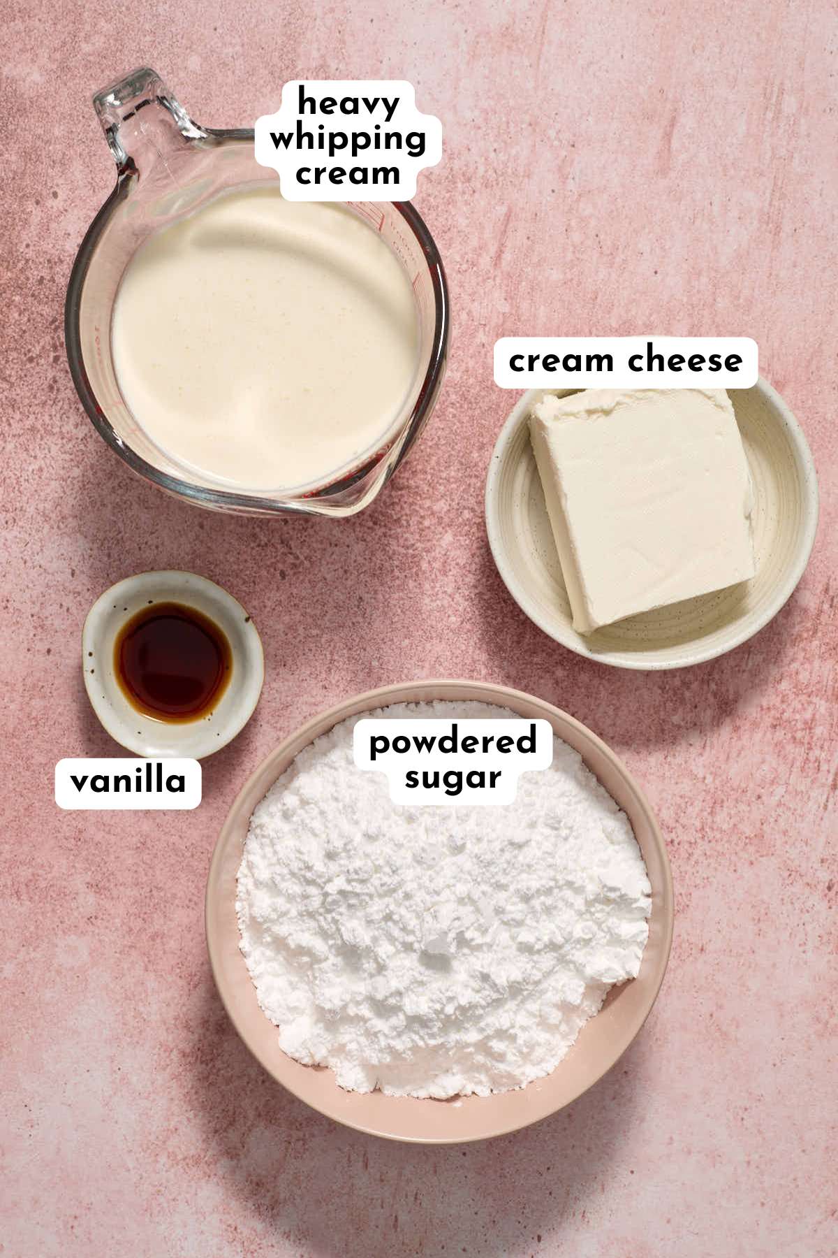 Ingredients to make whipped cream cheese frosting arranged individually and labeled.
