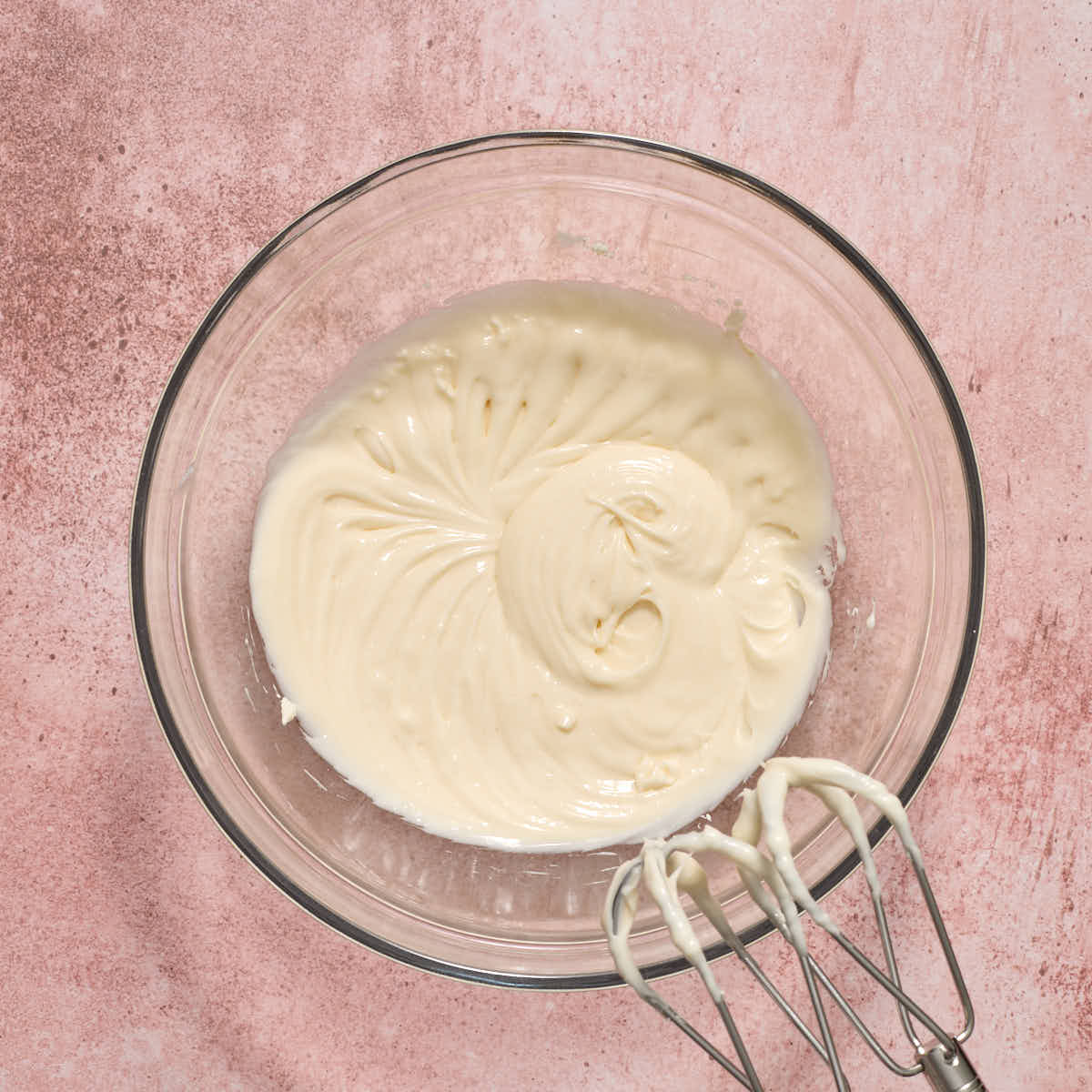 Powdered sugar beaten into cream cheese mixture until smooth.