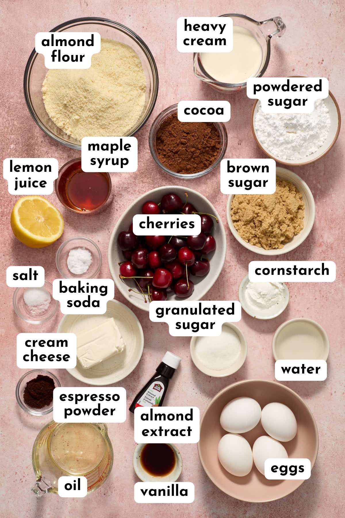 Ingredients to make almond flour black forest cupcakes arranged individually and labeled.