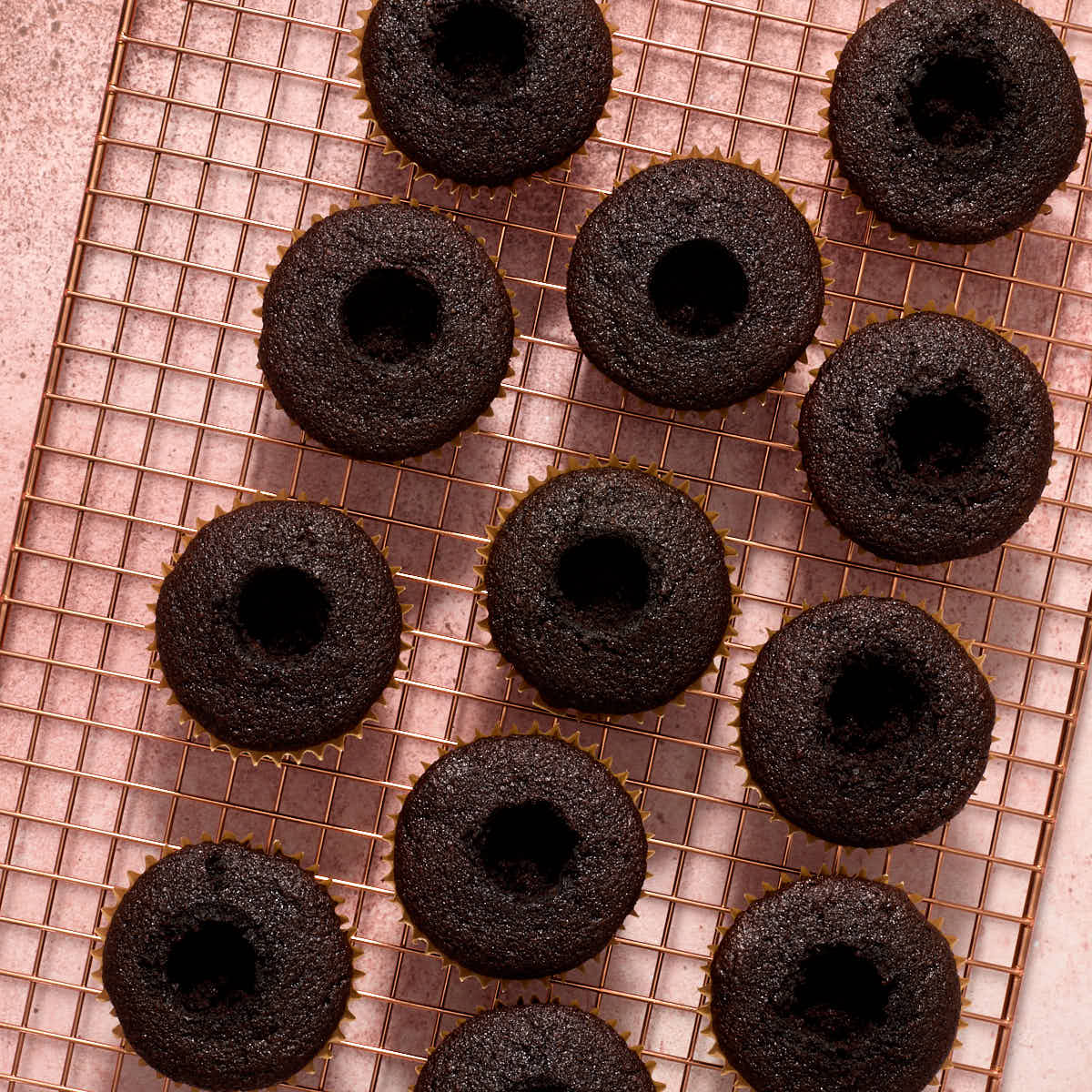 Centers of each cupcake scooped out.