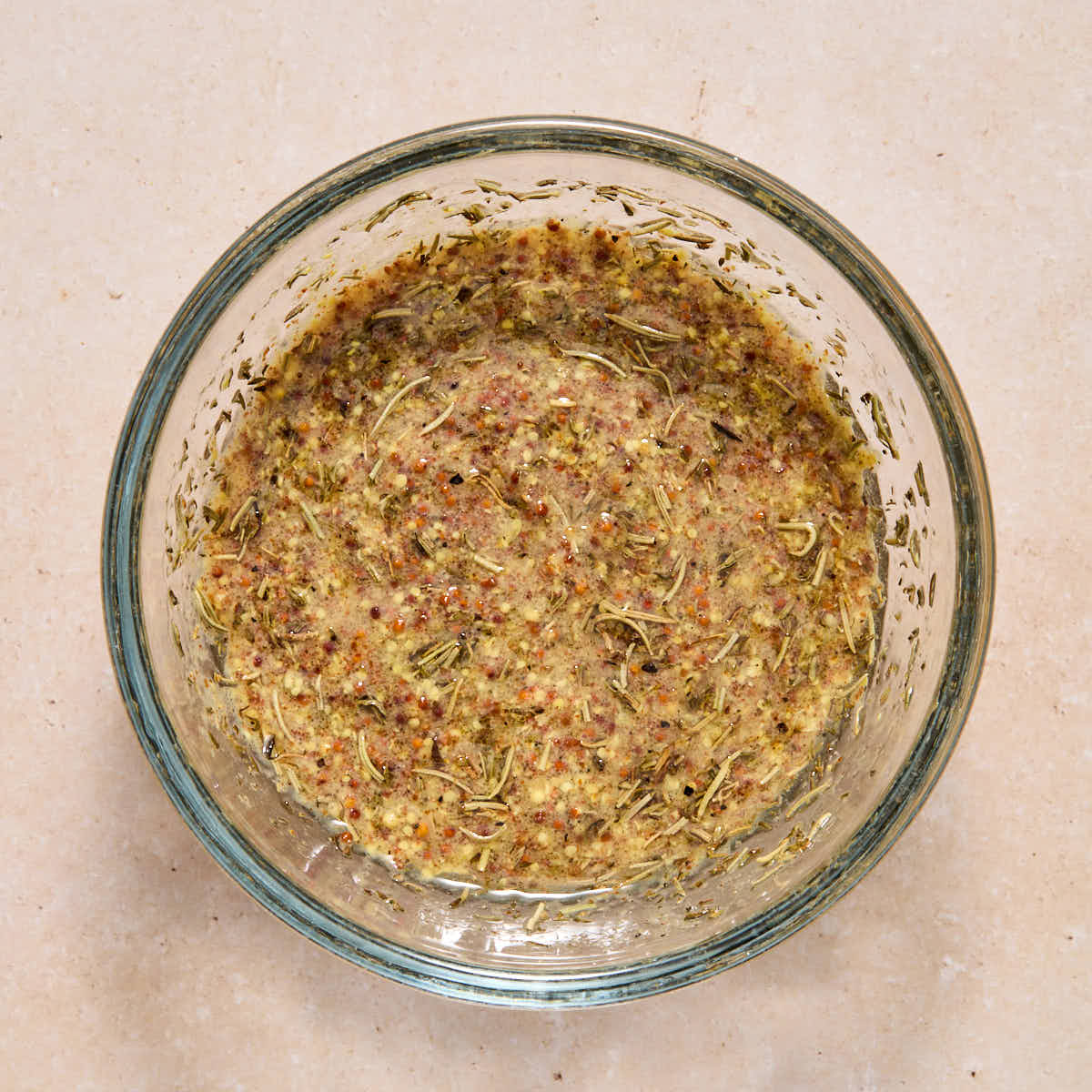 Glaze ingredients mixed together in a small glass bowl.
